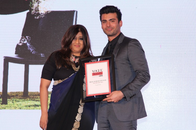Priya Tanna, Editor, Vogue India presenting the award for ‘Most Beautiful Man’ to Fawad Khan at the Vogue Beauty Awards 2015, Palladium Hotel, Mumbai